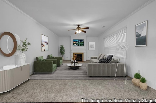 7601 Watson Cir, Locust Grove, GA 30248 - carpeted living area with crown molding, a fireplace, ceiling fan, and baseboards