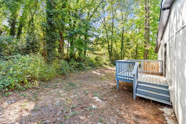 view of yard featuring a deck