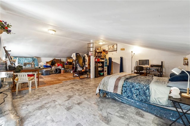 bedroom featuring lofted ceiling