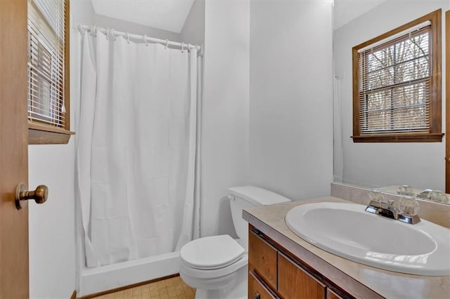 bathroom featuring vanity, tile patterned floors, toilet, and a shower with curtain