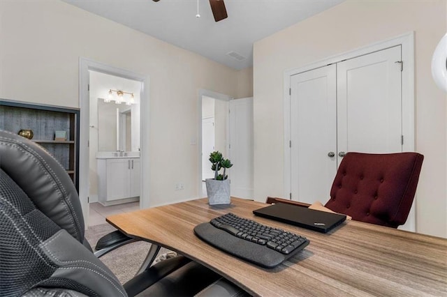 office with visible vents and ceiling fan