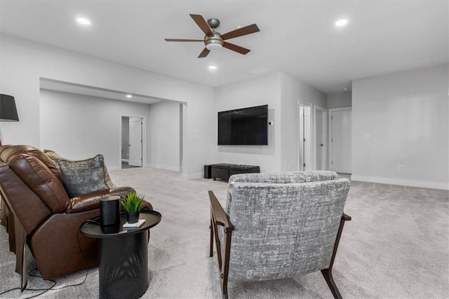 carpeted living room with recessed lighting, baseboards, and ceiling fan