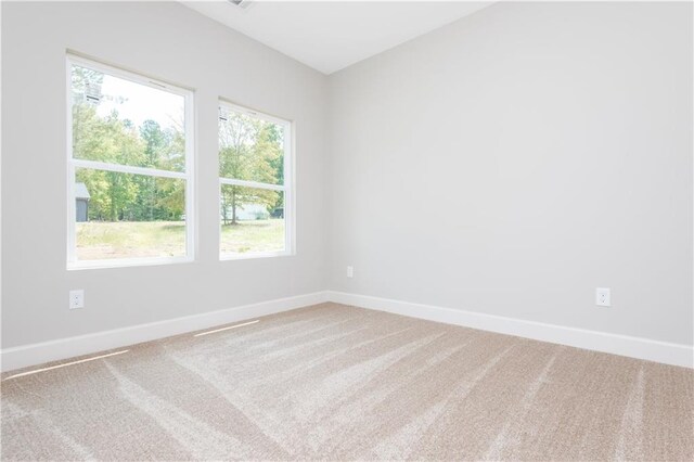 121 Hunters Ln, Powder Springs, GA 30127 - empty room featuring carpet flooring and baseboards