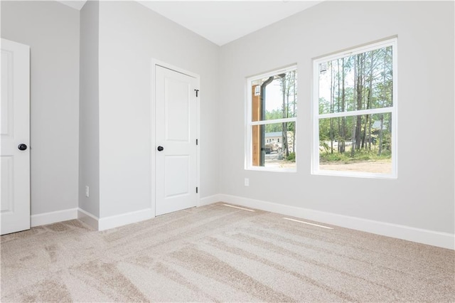 121 Hunters Ln, Powder Springs, GA 30127 - carpeted spare room with baseboards