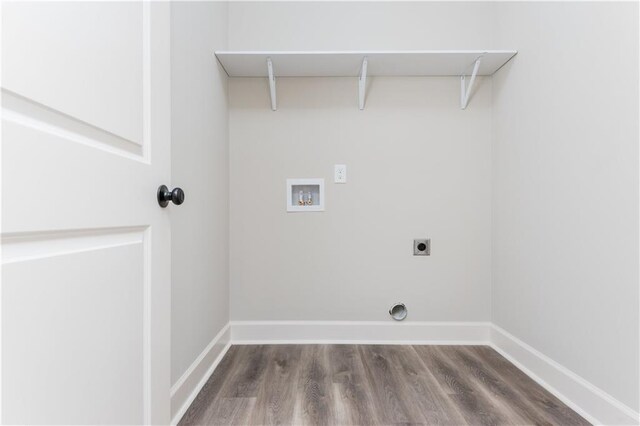 121 Hunters Ln, Powder Springs, GA 30127 - clothes washing area featuring hookup for an electric dryer, laundry area, baseboards, and washer hookup