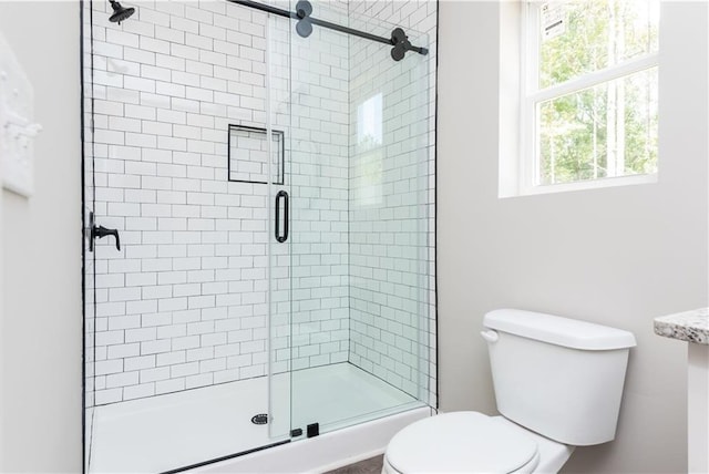 121 Hunters Ln, Powder Springs, GA 30127 - full bath featuring a shower stall and toilet