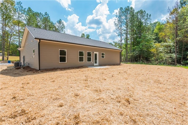 121 Hunters Ln, Powder Springs, GA 30127 - back of property featuring central air condition unit