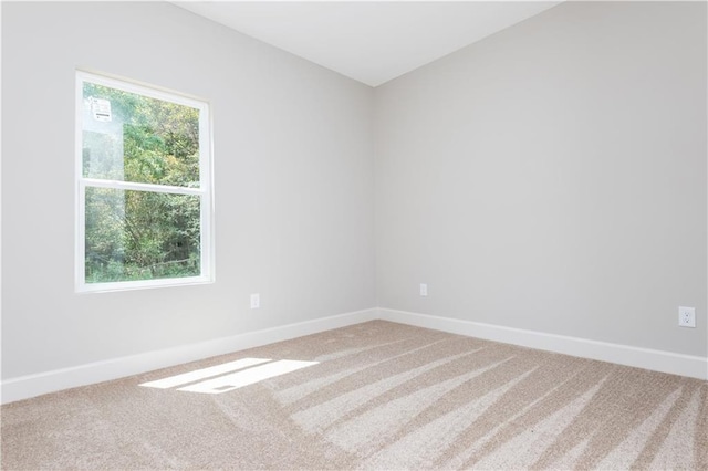 121 Hunters Ln, Powder Springs, GA 30127 - spare room with a healthy amount of sunlight, baseboards, and carpet floors