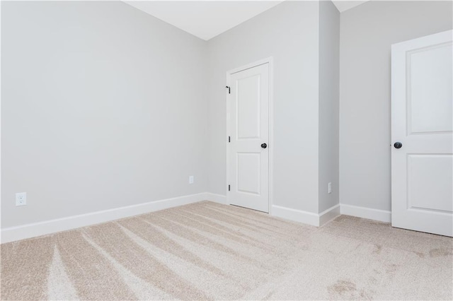 121 Hunters Ln, Powder Springs, GA 30127 - spare room featuring baseboards and carpet floors