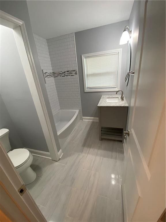 2319 Beecher Rd SW, Atlanta, GA 30311 - full bath featuring toilet, vanity, and baseboards