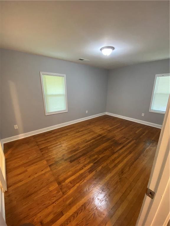 2319 Beecher Rd SW, Atlanta, GA 30311 - unfurnished room with dark wood finished floors and baseboards
