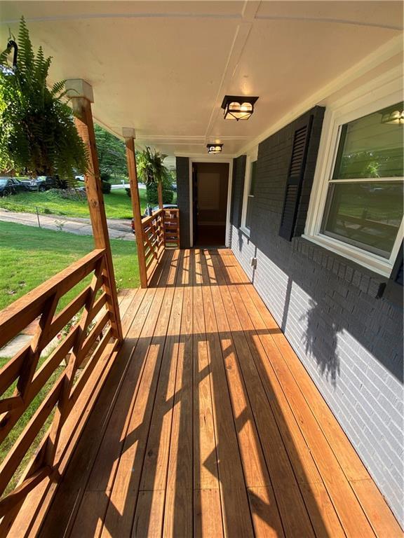 2319 Beecher Rd SW, Atlanta, GA 30311 - porch with a lawn