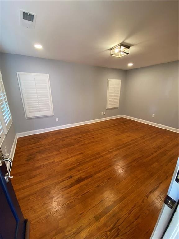 2319 Beecher Rd SW, Atlanta, GA 30311 - empty room with wood finished floors, baseboards, and recessed lighting