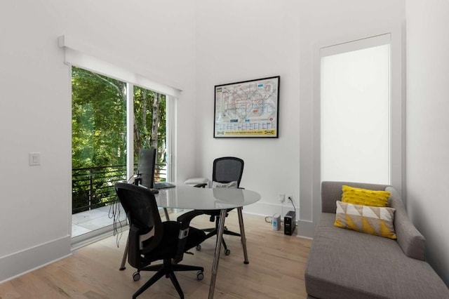 office with light wood finished floors and baseboards