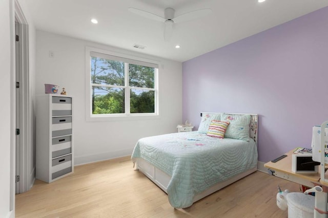 bedroom with light wood finished floors, recessed lighting, baseboards, and a ceiling fan