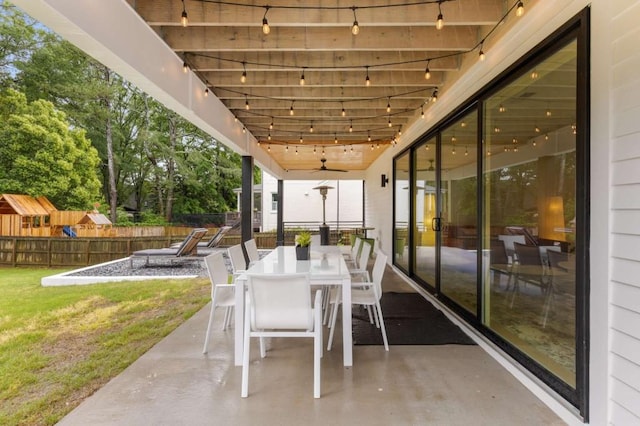 view of patio / terrace featuring outdoor dining space and ceiling fan