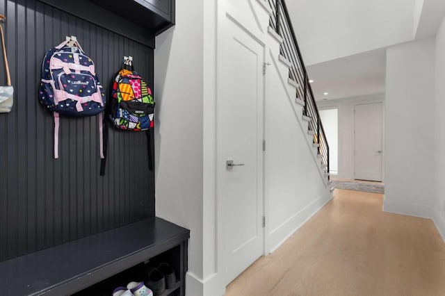 mudroom featuring baseboards and recessed lighting