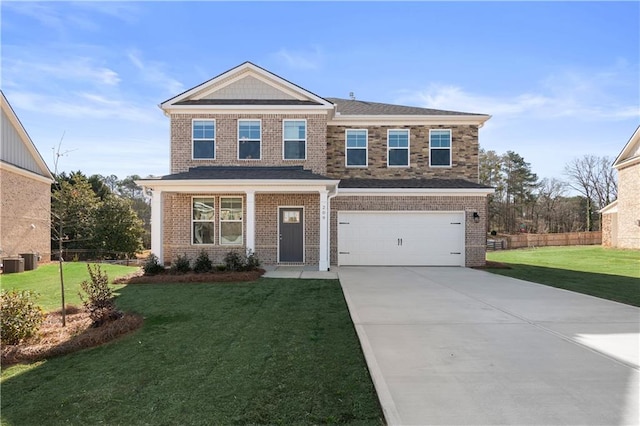 209 Chiswick Loop, Stockbridge, GA 30281 - view of front of property featuring driveway, brick siding, and an attached garage
