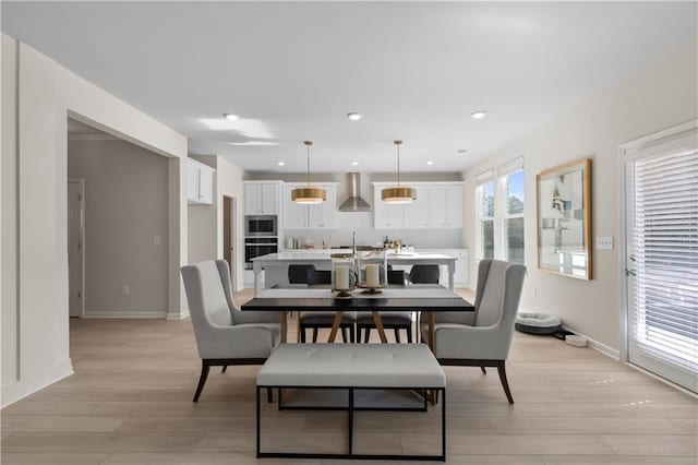 209 Chiswick Loop, Stockbridge, GA 30281 - dining room featuring light wood finished floors and recessed lighting