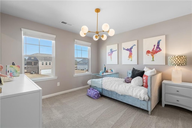 209 Chiswick Loop, Stockbridge, GA 30281 - bedroom with a chandelier and light colored carpet