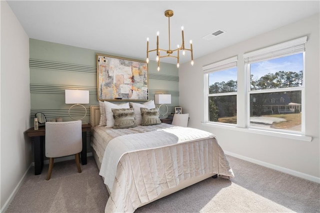 209 Chiswick Loop, Stockbridge, GA 30281 - carpeted bedroom featuring a chandelier and baseboards