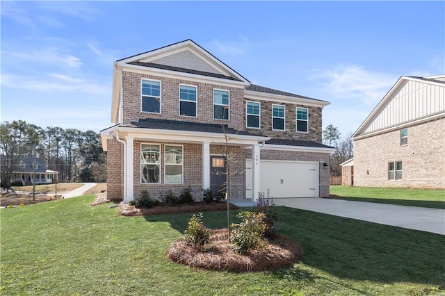 209 Chiswick Loop, Stockbridge, GA 30281 - view of front facade featuring driveway, an attached garage, a front yard, and brick siding