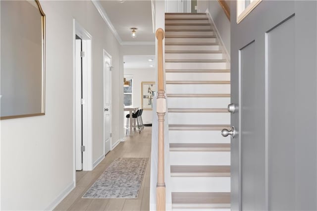 209 Chiswick Loop, Stockbridge, GA 30281 - foyer entrance featuring stairs, light wood-type flooring, and crown molding