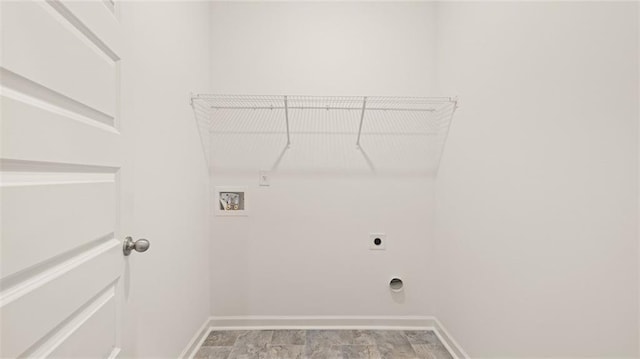 clothes washing area with hookup for a washing machine and hookup for an electric dryer