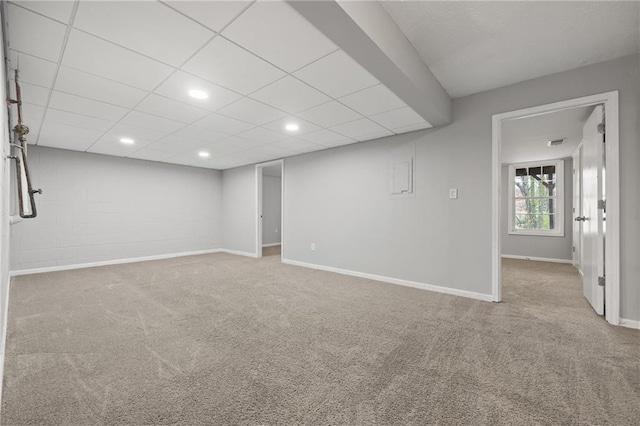 basement with recessed lighting, baseboards, and carpet floors