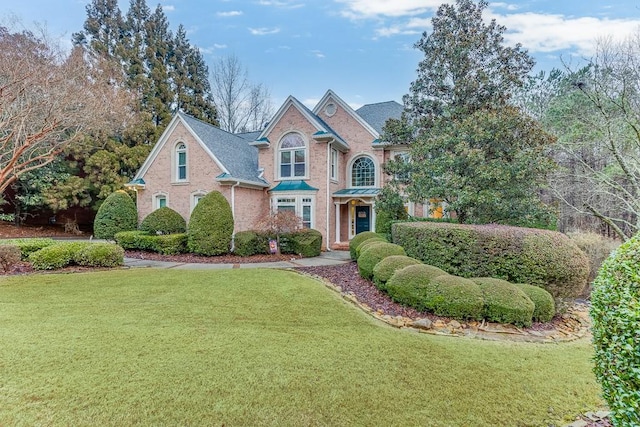 view of front property with a front lawn