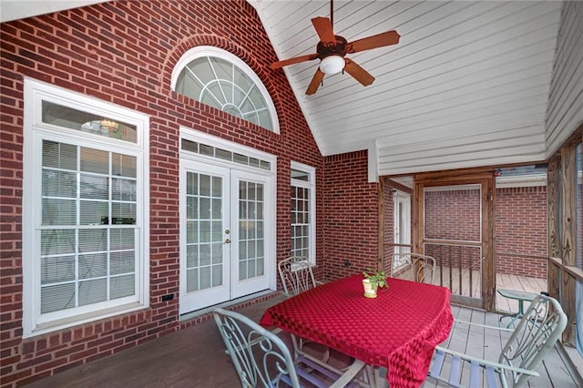 exterior space featuring ceiling fan, lofted ceiling, and french doors