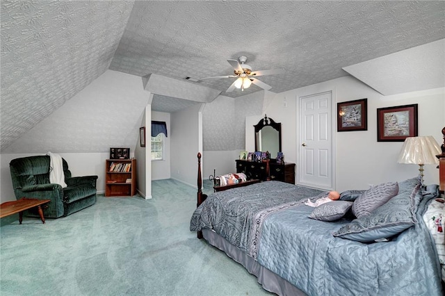 bedroom with a textured ceiling, light colored carpet, ceiling fan, and lofted ceiling