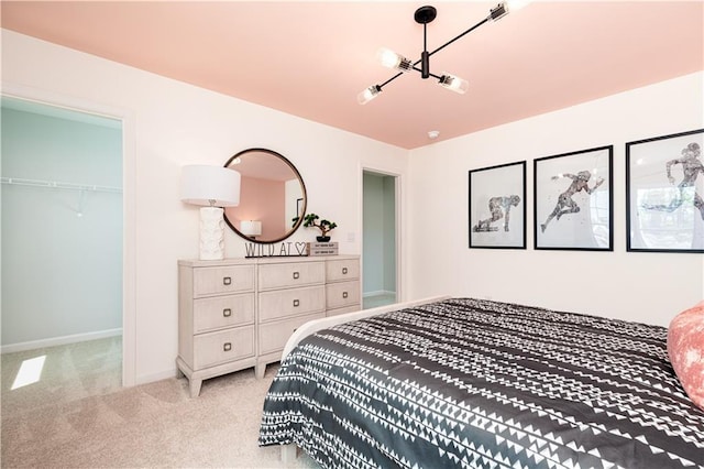 608 Belshire Dr, Acworth, GA 30102 - bedroom featuring light colored carpet, a spacious closet, and a closet