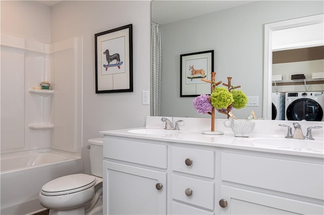 608 Belshire Dr, Acworth, GA 30102 - bathroom featuring separate washer and dryer, double vanity, and bathtub / shower combination
