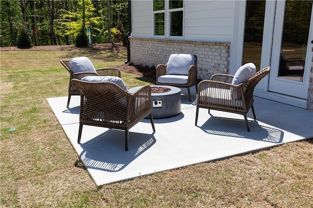 608 Belshire Dr, Acworth, GA 30102 - view of patio featuring an outdoor fire pit