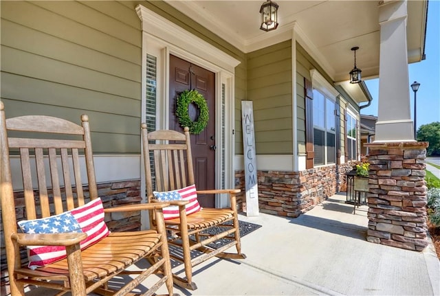 property entrance with covered porch