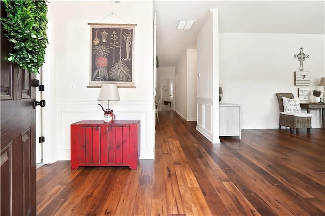 hallway with dark hardwood / wood-style floors