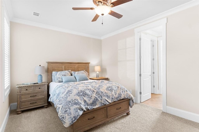 bedroom featuring light carpet, ceiling fan, and ornamental molding