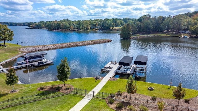 exterior space featuring a water view and a yard