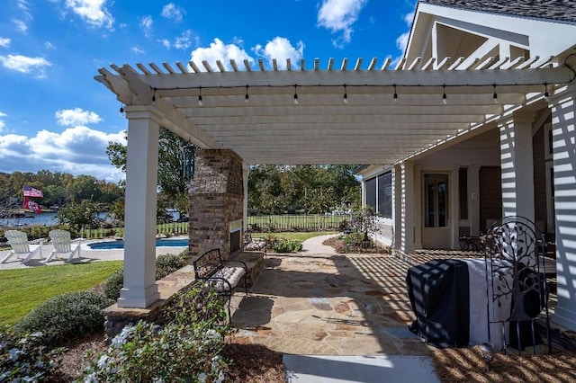 view of patio / terrace with a fenced in pool, a grill, and a pergola