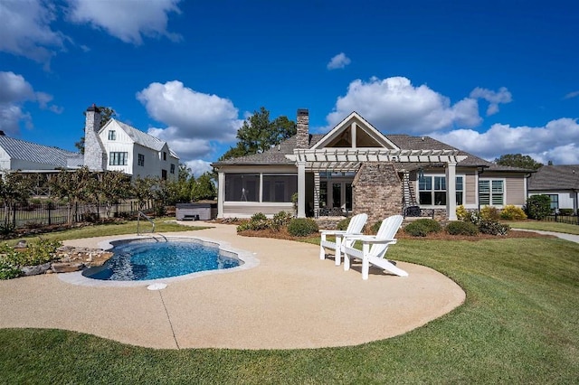 view of swimming pool featuring a pergola, a sunroom, a lawn, and a patio