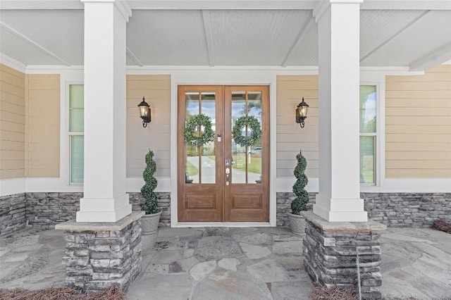 property entrance featuring french doors