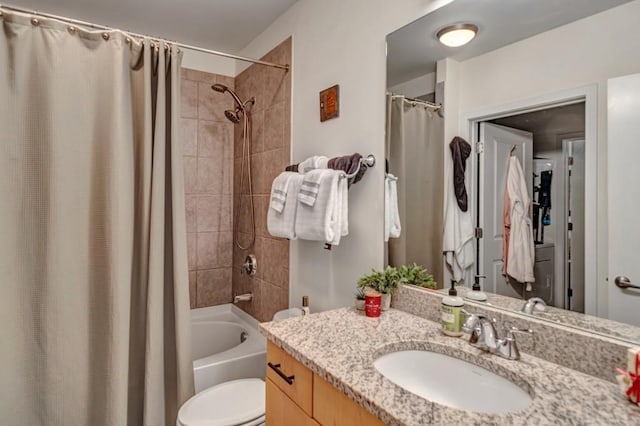 full bathroom with shower / bath combination with curtain, toilet, and vanity