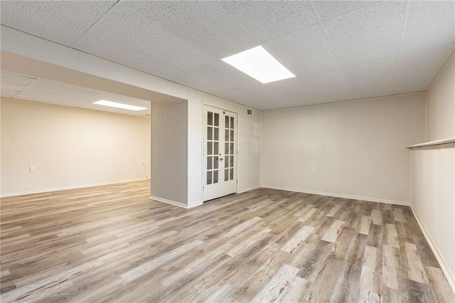 319 Hill Crest Cir, Woodstock, GA 30188 - finished basement featuring wood finished floors and baseboards