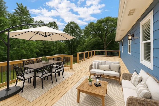 319 Hill Crest Cir, Woodstock, GA 30188 - wooden deck featuring an outdoor hangout area, outdoor dining space, and view of wooded area