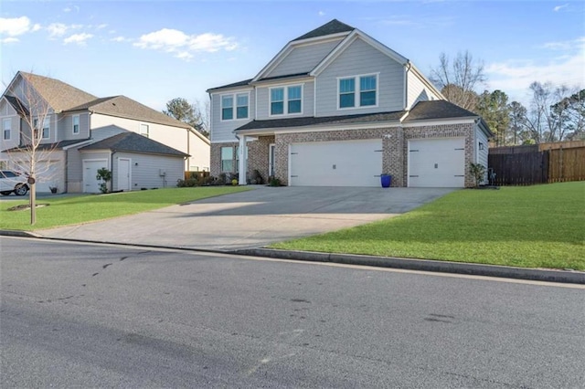 view of front of home featuring brick siding, an attached garage, a front lawn, fence, and driveway