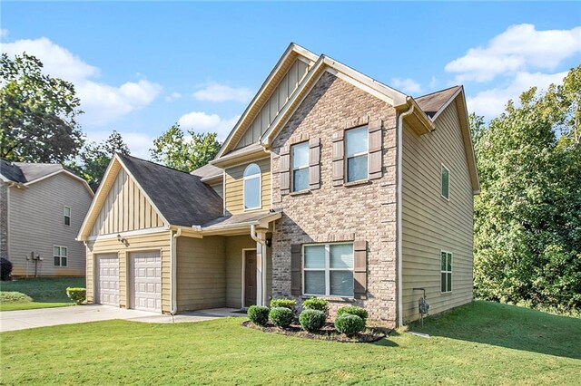 craftsman-style house with a front lawn and a garage