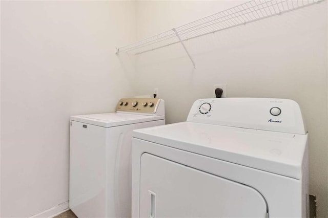 washroom with washer and clothes dryer