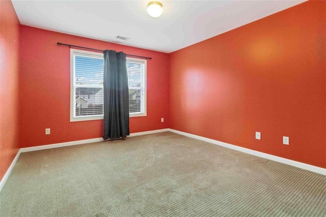 empty room with carpet floors