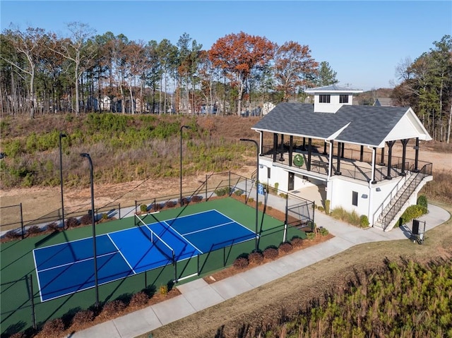 view of sport court with tennis court